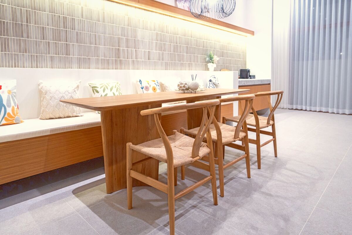 Open living and dining area with warm timber